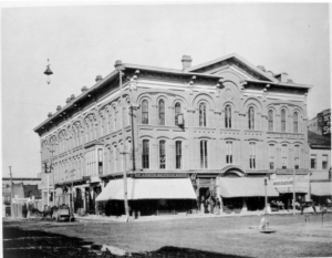 The Gregory Block, later named Masonic Block. Wahr's Bookstore visible at the right (Courtesy of the Bentley Historical Library)